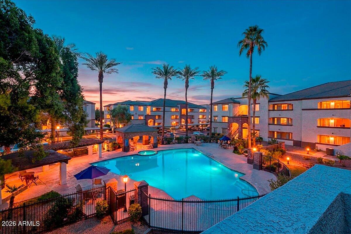 3302 North 7th Street, Unit 354 Phoenix, AZ 85014 - Photo 1 of 32 an outdoor space with pool and furniture