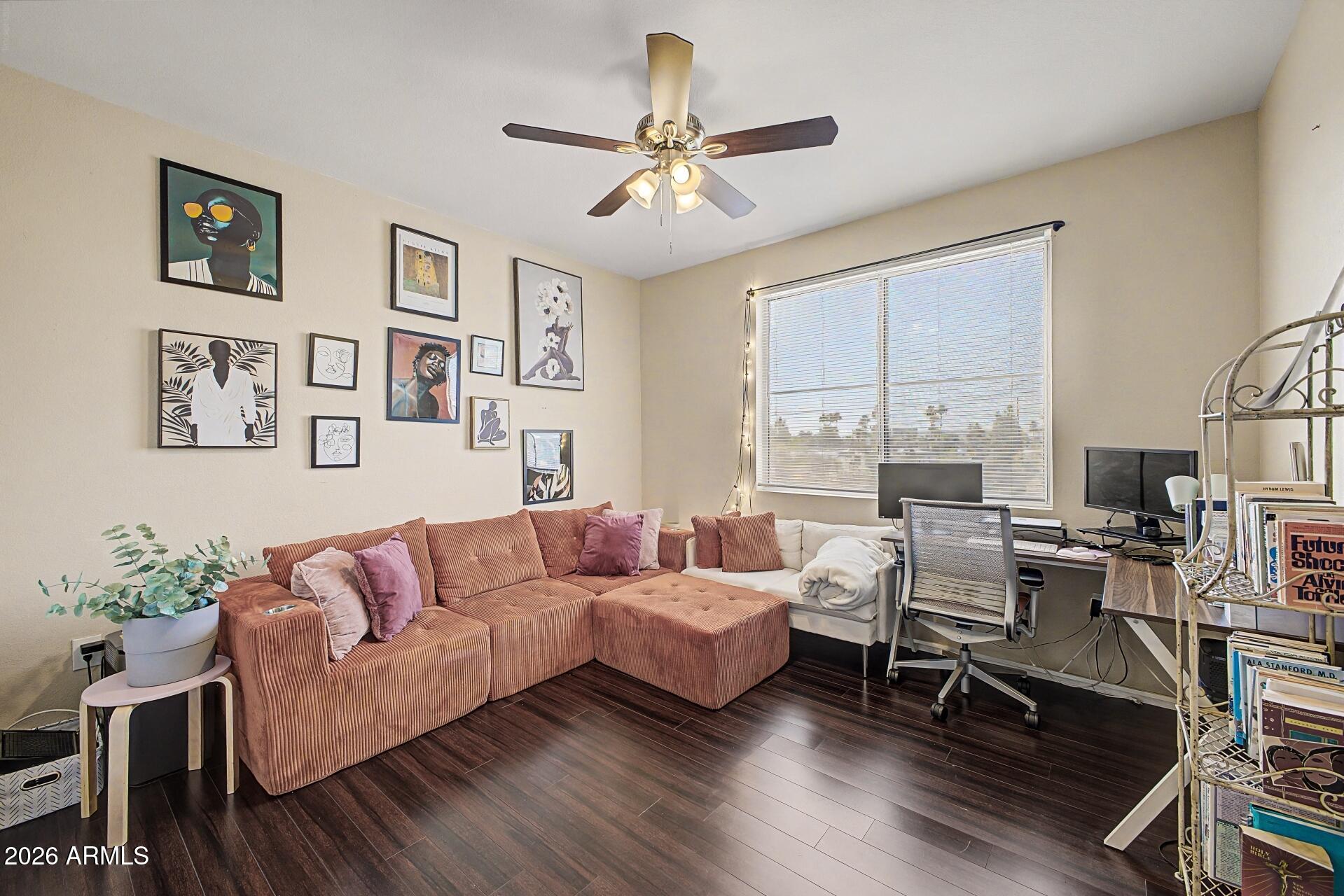 3302 North 7th Street, Unit 354 Phoenix, AZ 85014 - Photo 17 of 32 a living room with furniture and a large window