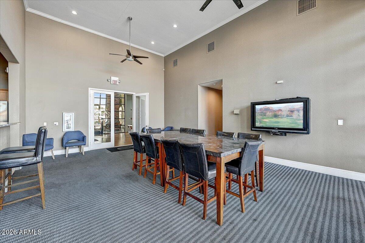 3302 North 7th Street, Unit 354 Phoenix, AZ 85014 - Photo 29 of 32 a view of a dining room with furniture and wooden floor