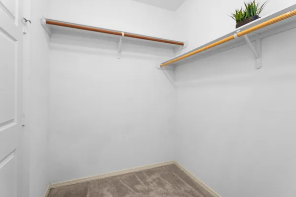 a view of empty room with windows