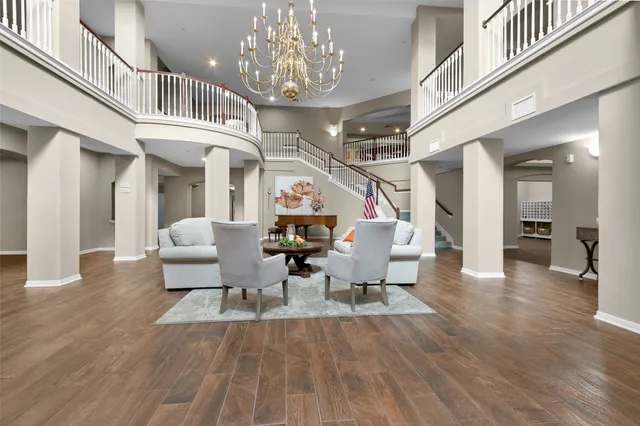 a view of swimming pool with a lounge chairs
