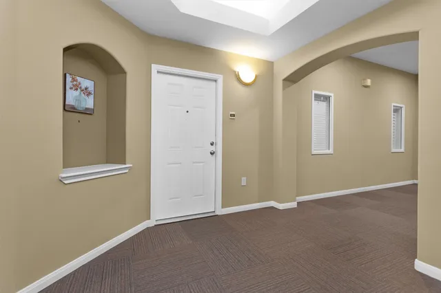 an empty room with windows