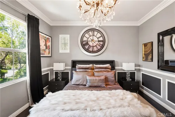 a bathroom with a granite countertop sink toilet a mirror and shower