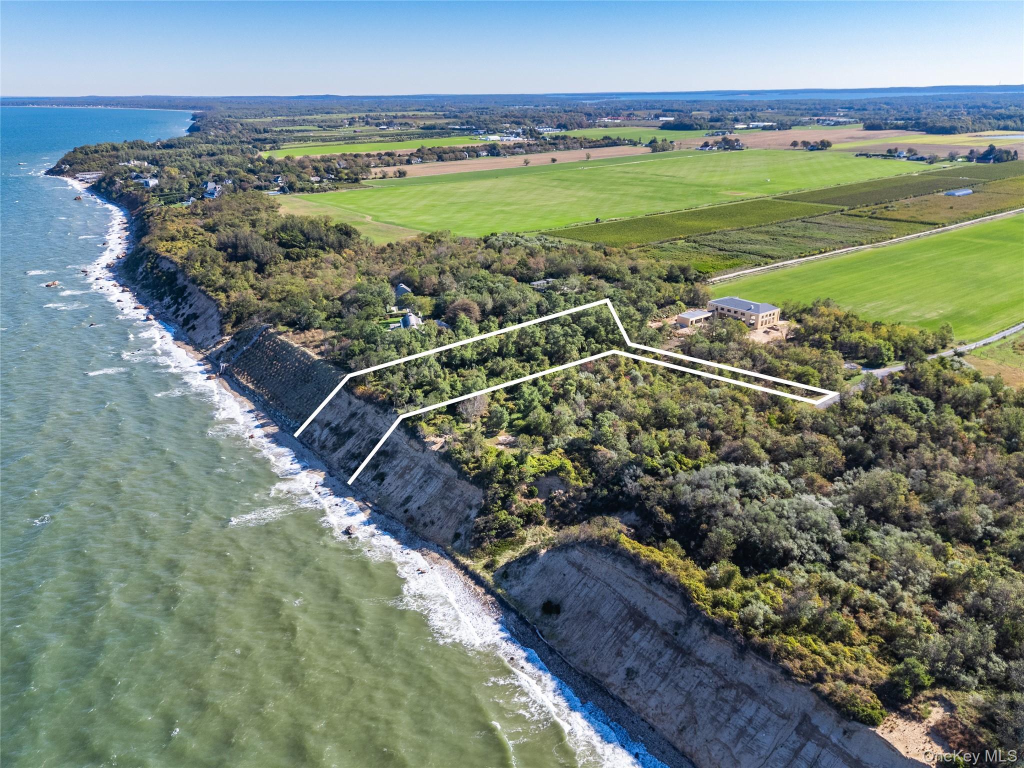 6121 Oregon Road Cutchogue, NY 11935 - Photo 11 of 22 a view of a lush green field
