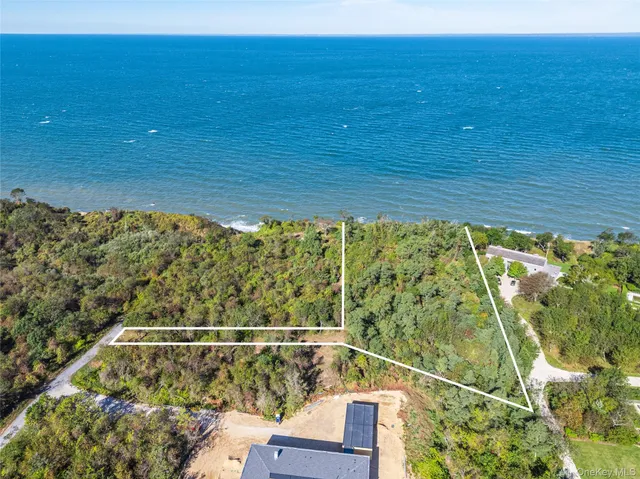 a view of balcony with wooden floor
