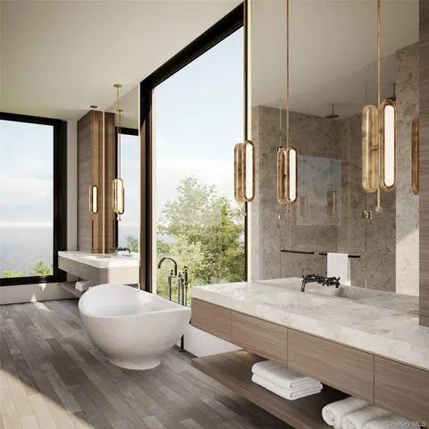 a spacious bathroom with a large tub and shower
