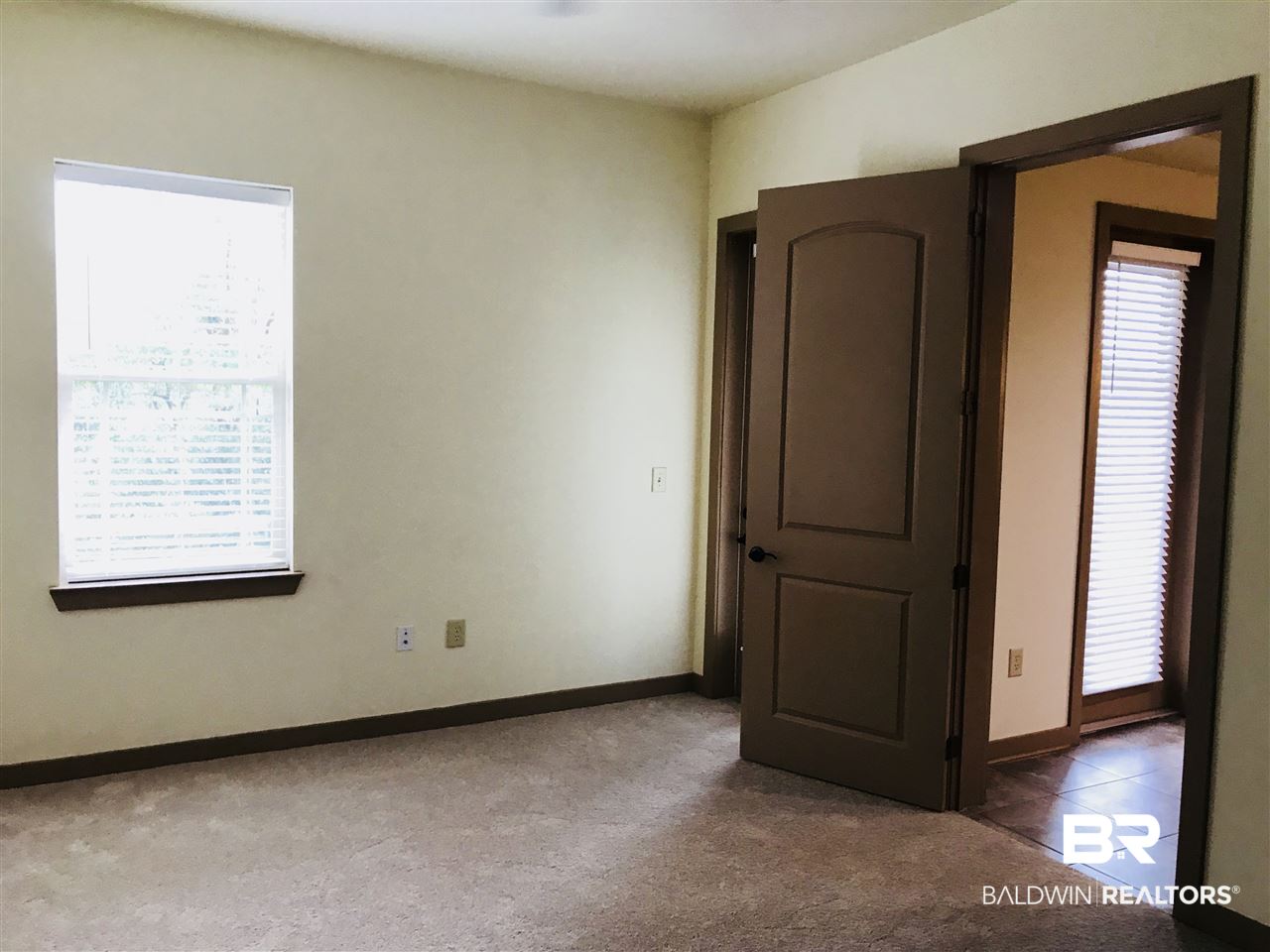 1430 Regency Road, Unit D204 Gulf Shores, AL 36542 - Photo 8 of 18 Master Bedroom