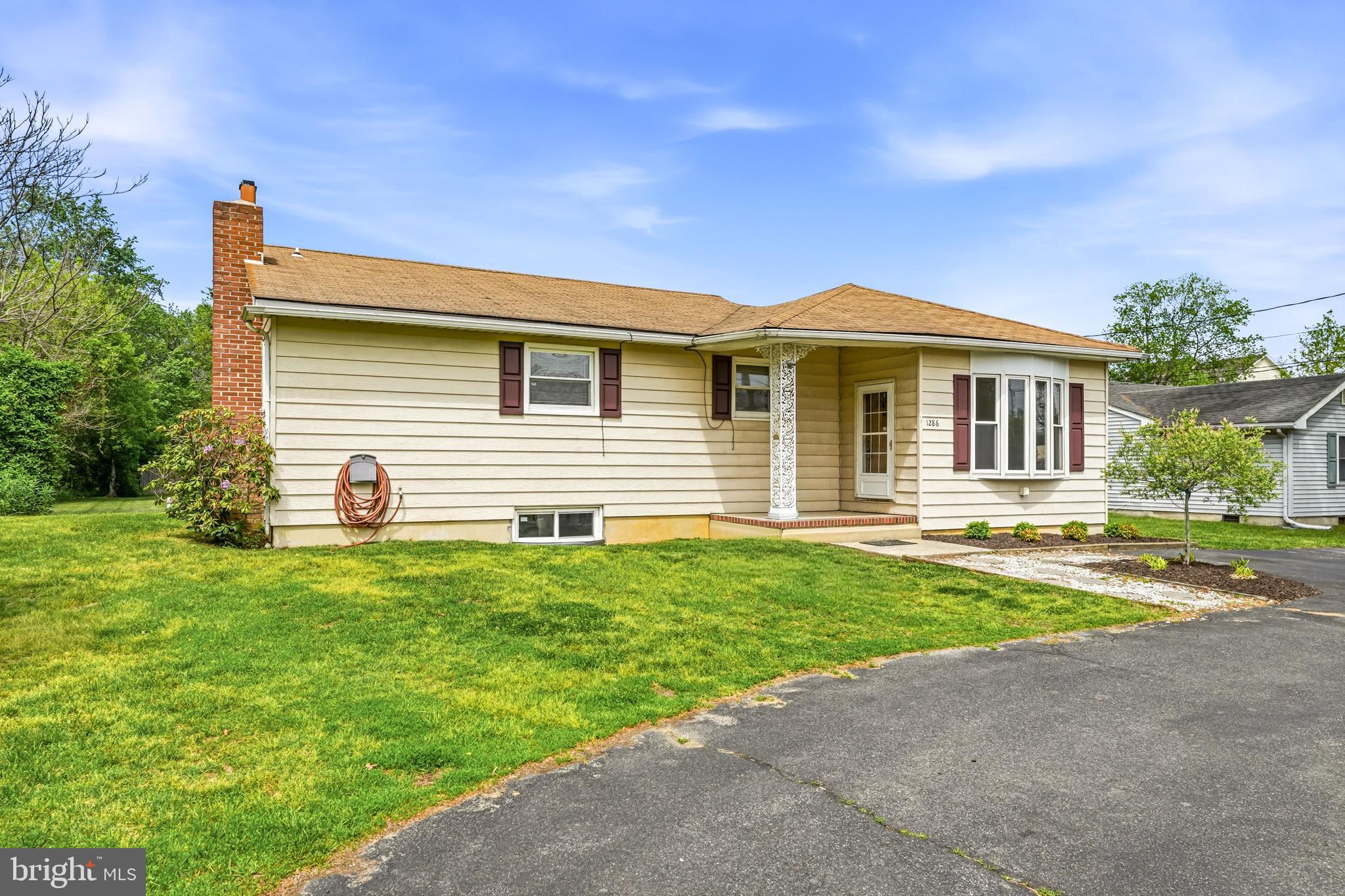 1286 Glassboro Road Williamstown, NJ 08094 - Photo 2 of 41 a front view of a house with a yard