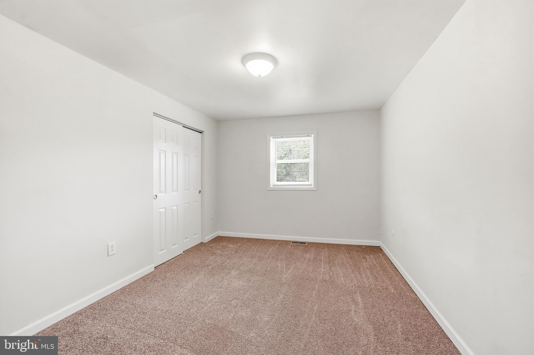 1286 Glassboro Road Williamstown, NJ 08094 - Photo 26 of 41 an empty room with a window