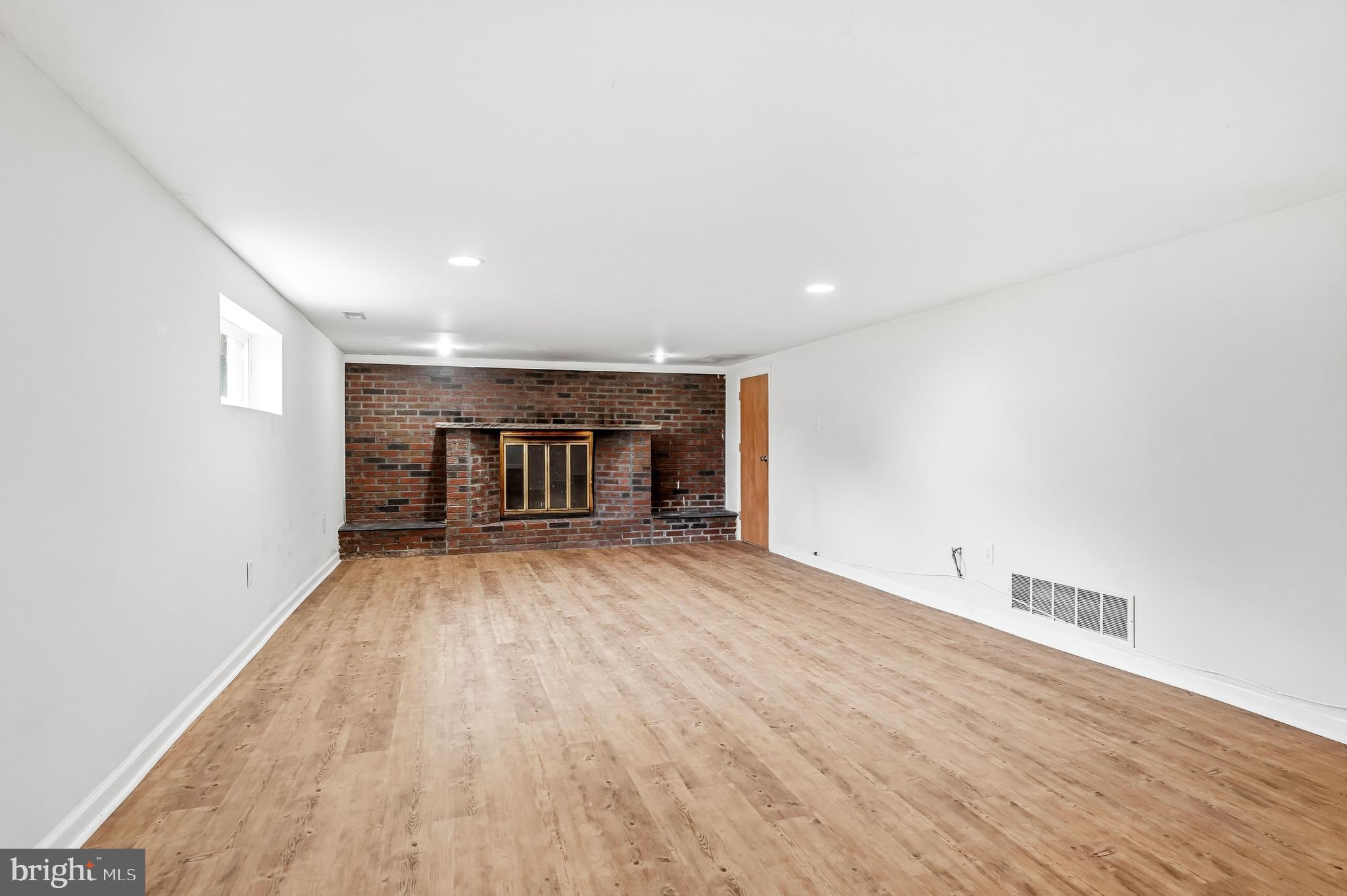 1286 Glassboro Road Williamstown, NJ 08094 - Photo 4 of 41 a view of empty room with wooden floor