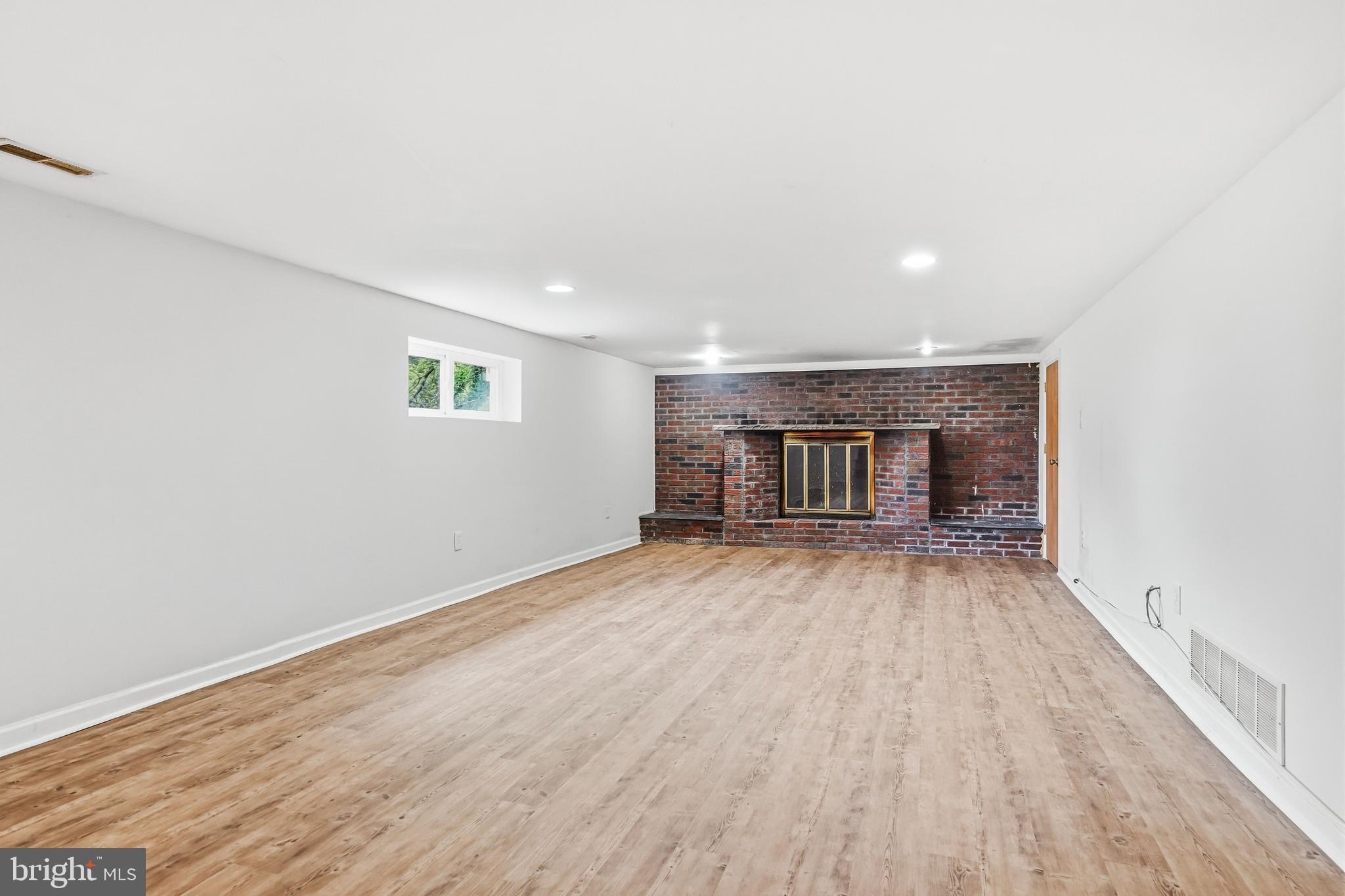 1286 Glassboro Road Williamstown, NJ 08094 - Photo 5 of 41 a view of empty room with wooden floor