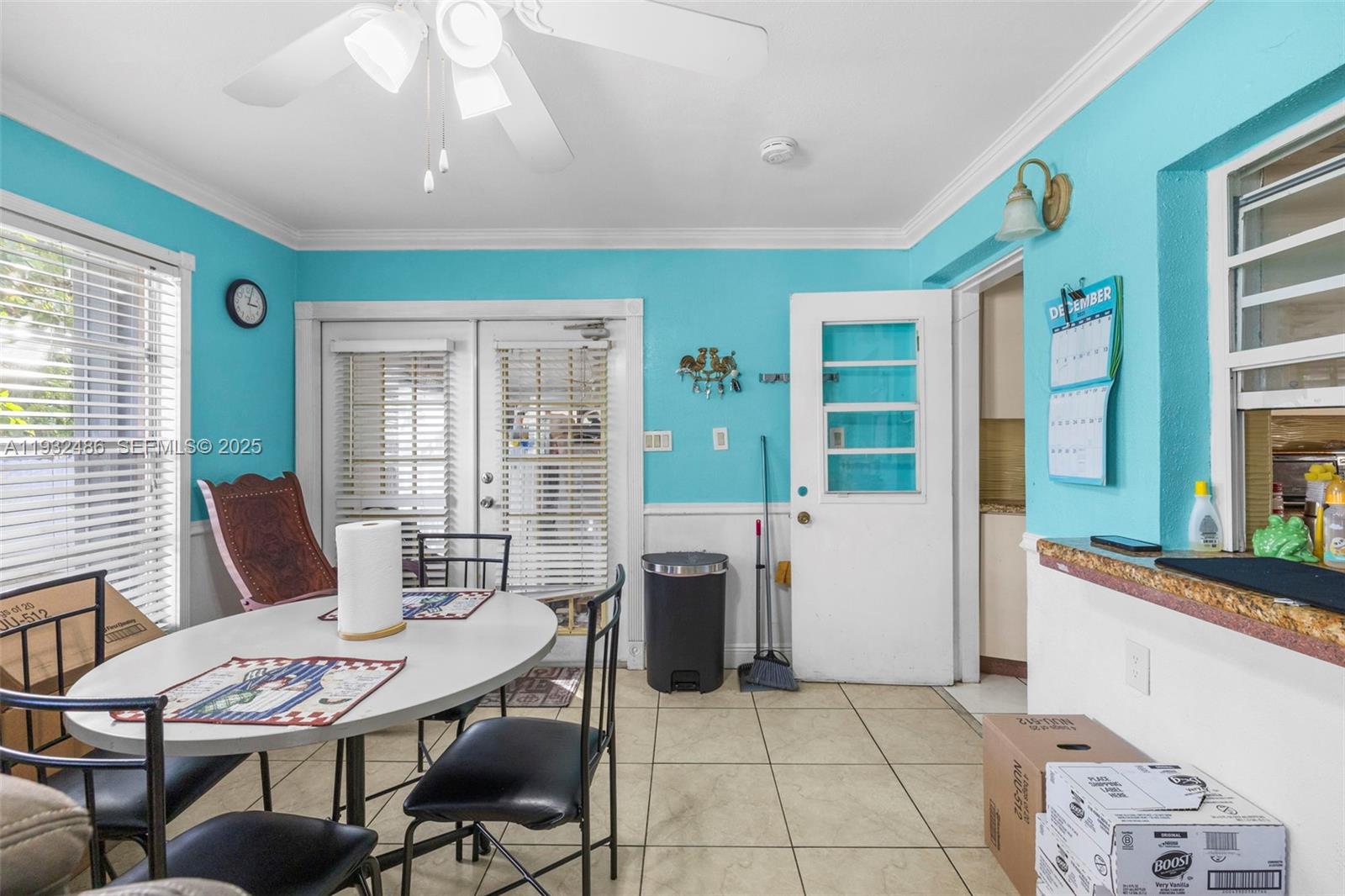 60 West 61st Street Hialeah, FL 33012 - Photo 11 of 43 a dining room with furniture and window