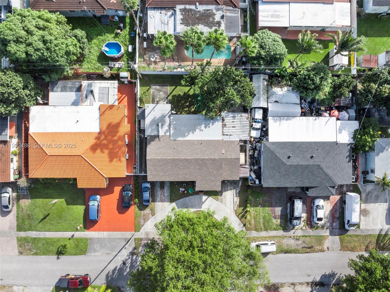 60 West 61st Street Hialeah, FL 33012 - Photo 26 of 43 an aerial view of a house with a yard and potted plants