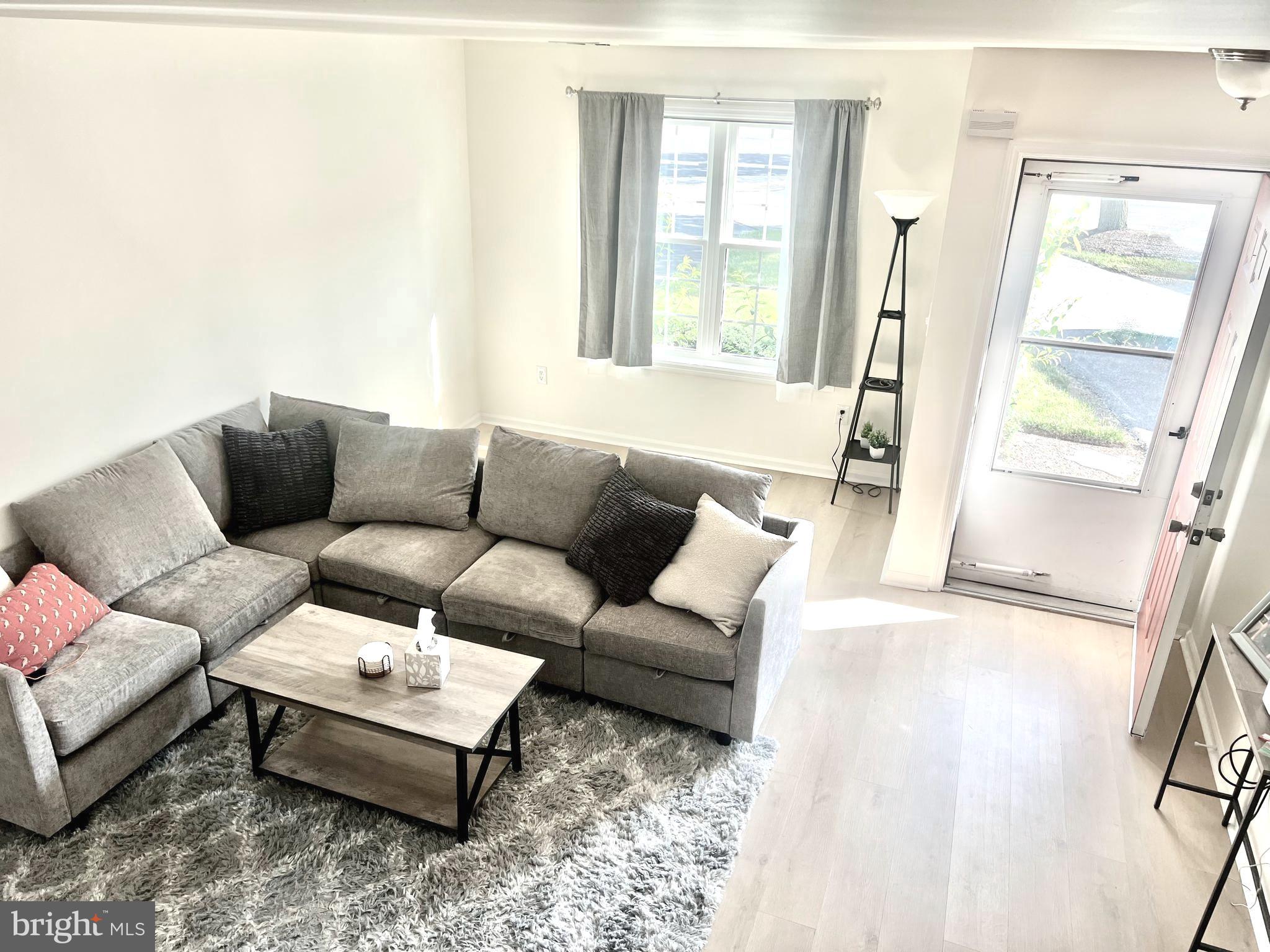 112 Spring Ridge Court Lancaster, PA 17601 - Photo 11 of 19 a living room with furniture and a window