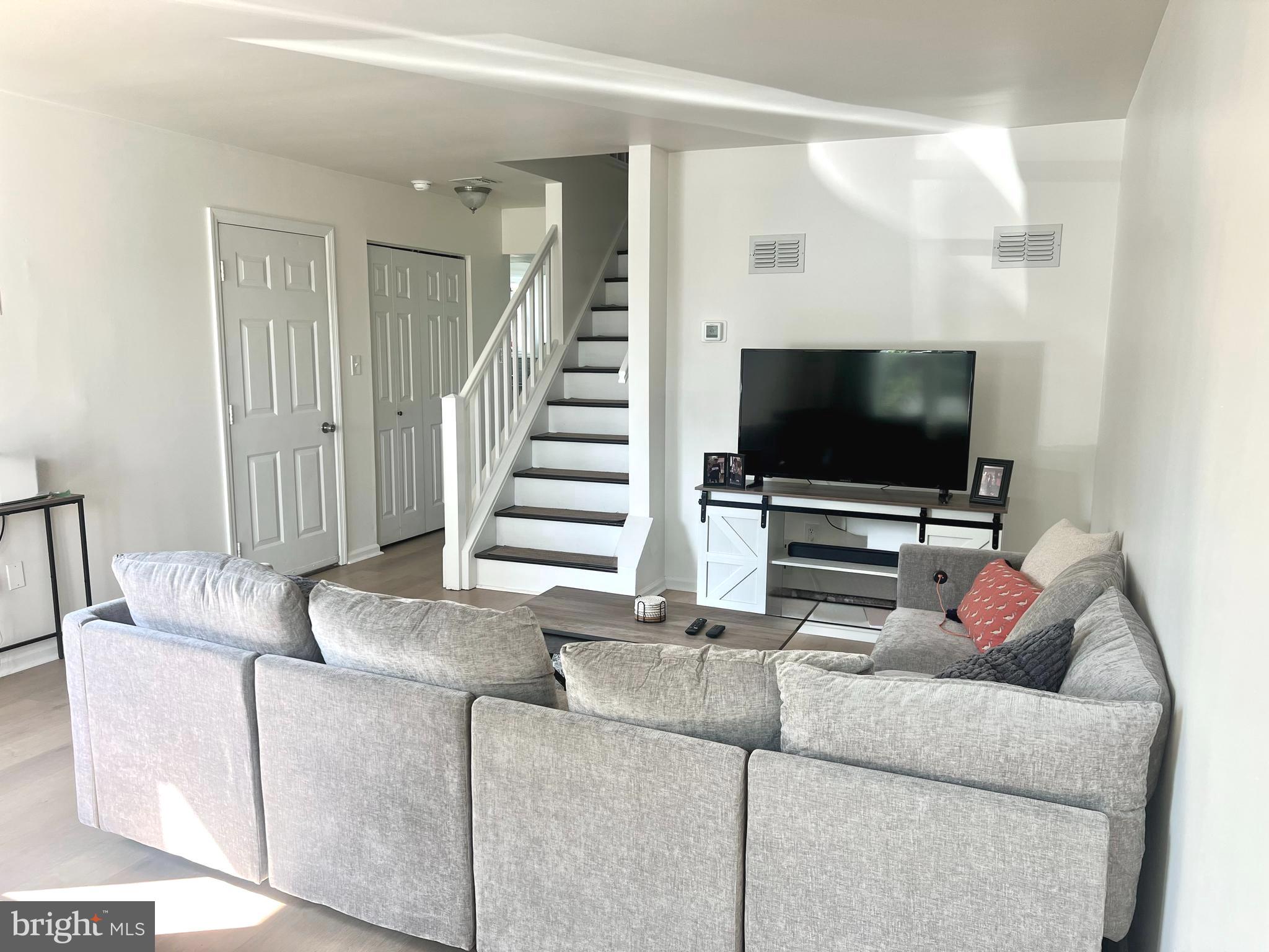 112 Spring Ridge Court Lancaster, PA 17601 - Photo 12 of 19 a living room with furniture and a flat screen tv