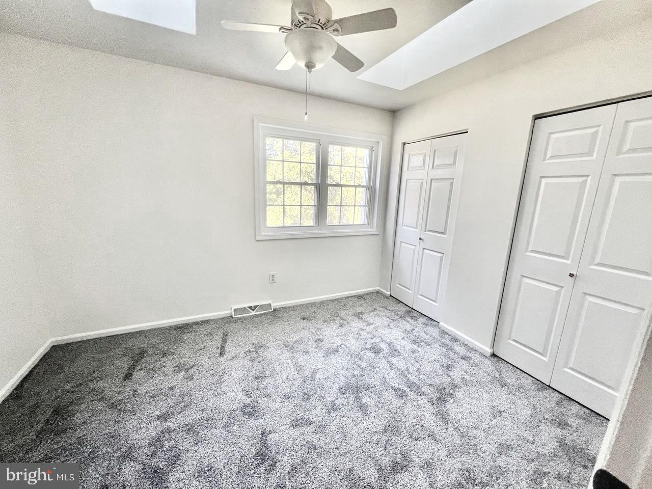 112 Spring Ridge Court Lancaster, PA 17601 - Photo 16 of 19 a view of a livingroom with a ceiling fan and window
