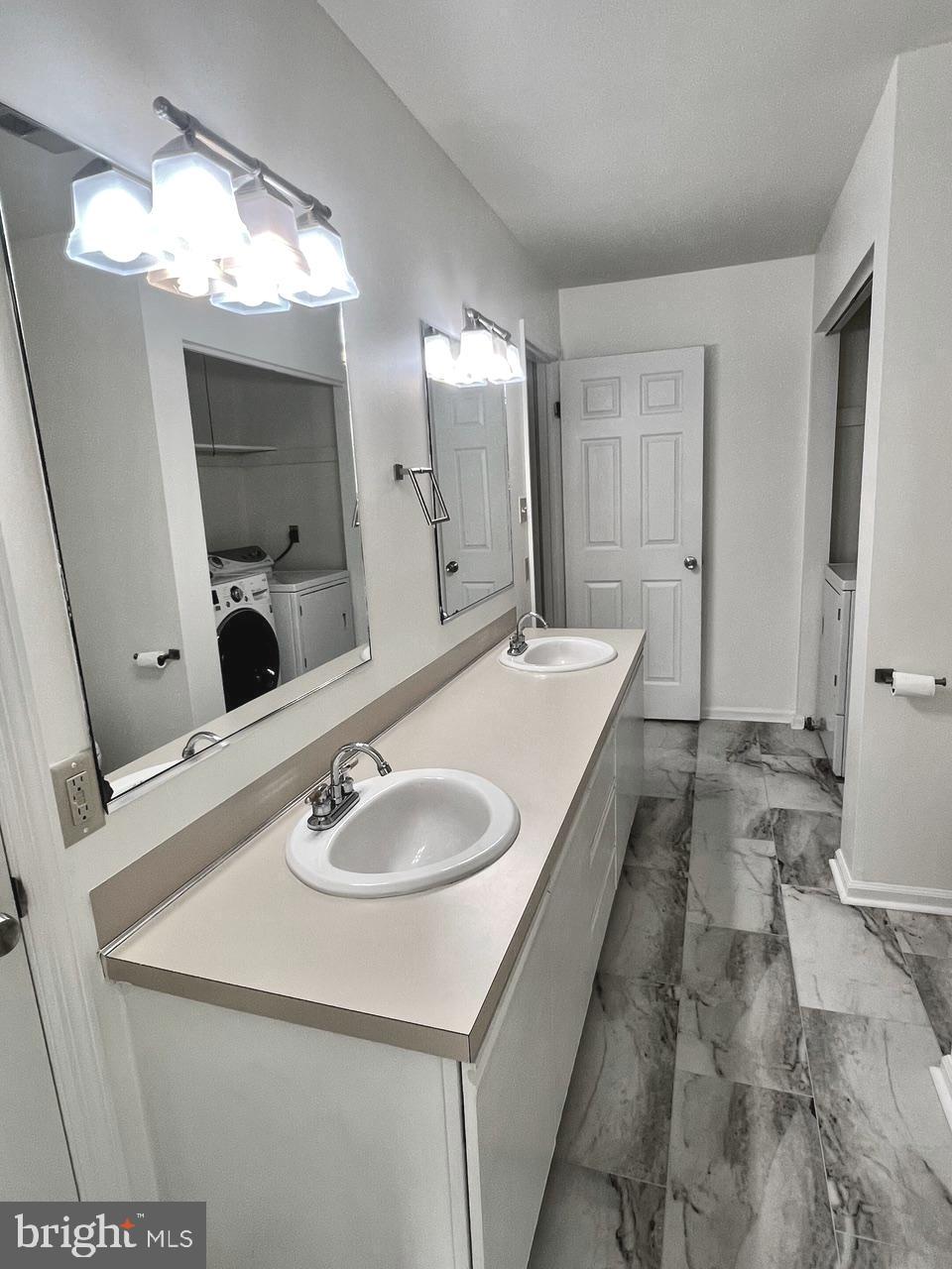 112 Spring Ridge Court Lancaster, PA 17601 - Photo 18 of 19 a bathroom with a sink and a mirror