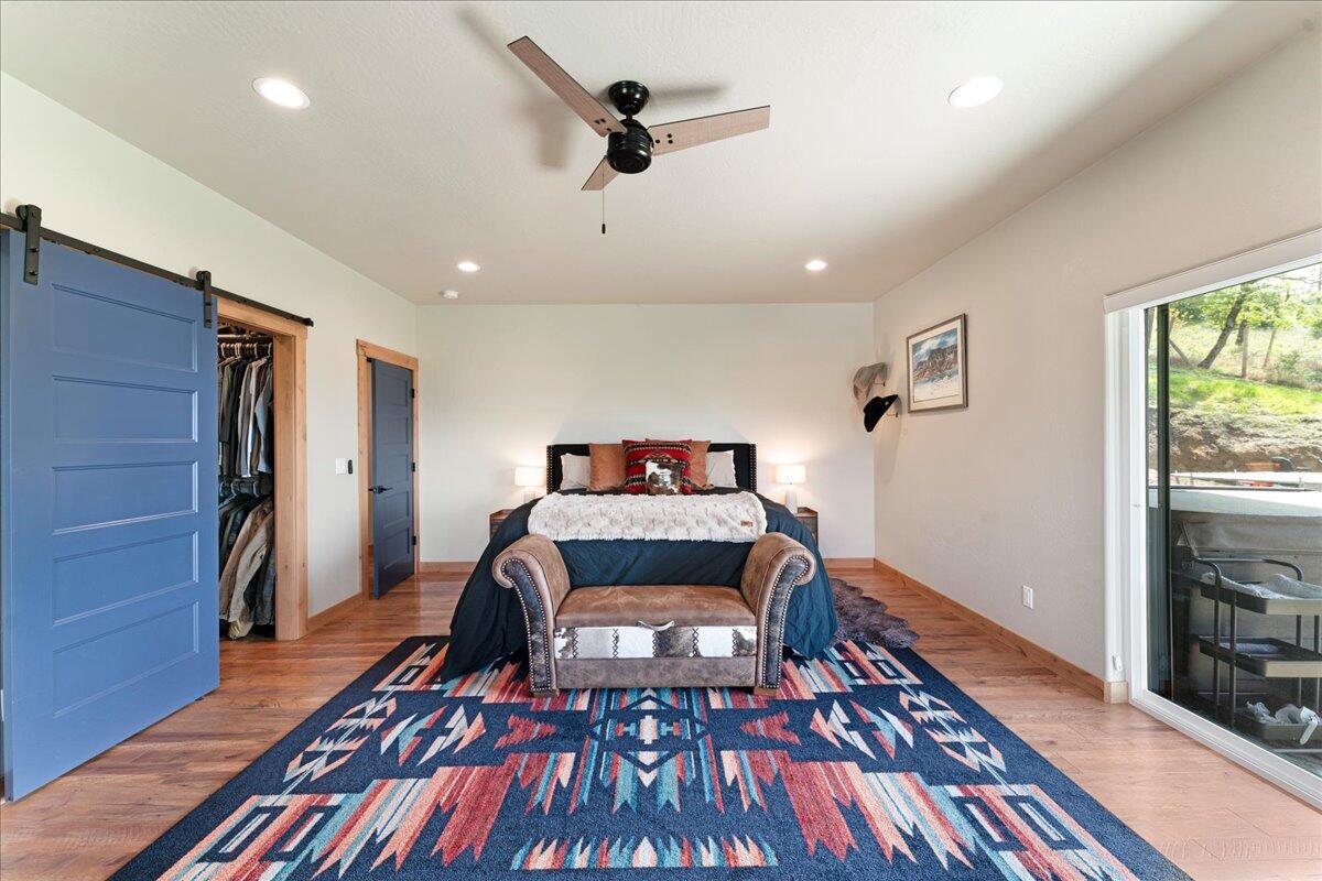 2220 Butte Falls Highway Eagle Point, OR 97524 - Photo 22 of 69 a bed room with a bed and a rug