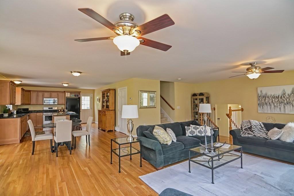 18 Massasoit Path Wayland, MA 01778 - Photo 12 of 39 a living room with furniture and wooden floor