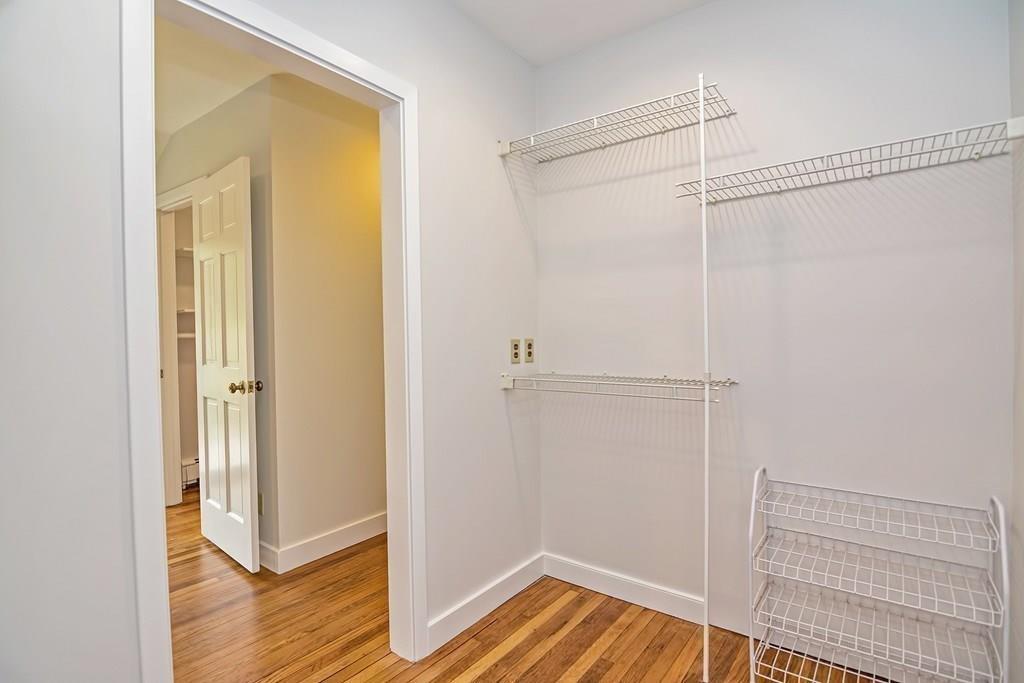 18 Massasoit Path Wayland, MA 01778 - Photo 21 of 39 a view of a room with wooden floor and closet area