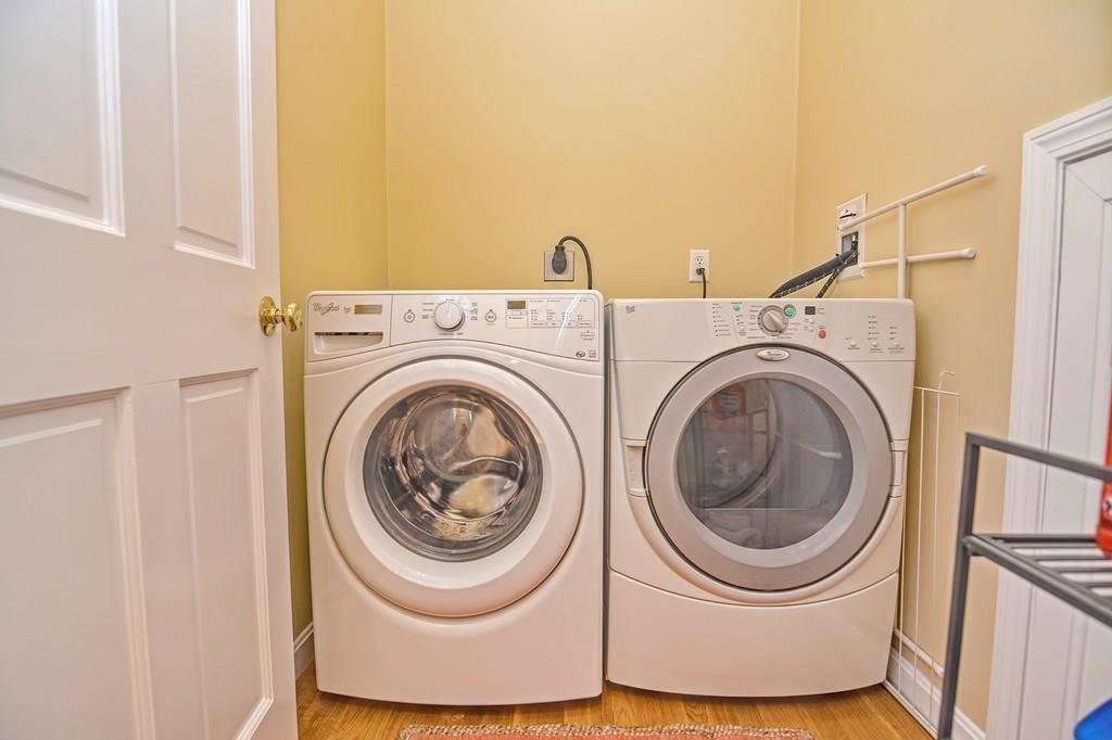 18 Massasoit Path Wayland, MA 01778 - Photo 23 of 39 a utility room with dryer and washer