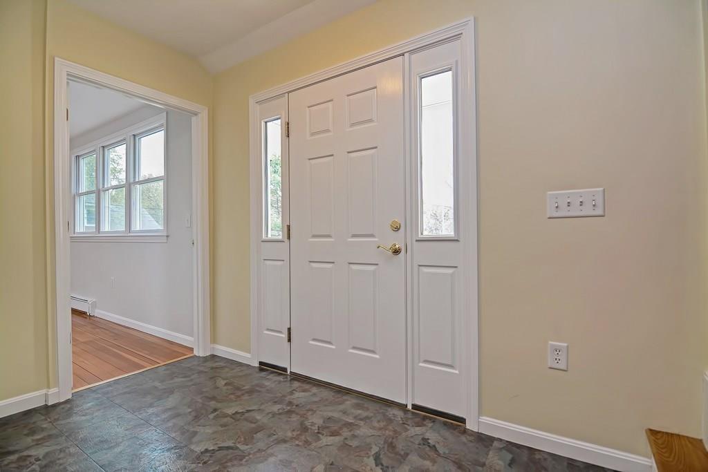 18 Massasoit Path Wayland, MA 01778 - Photo 25 of 39 an empty room with windows
