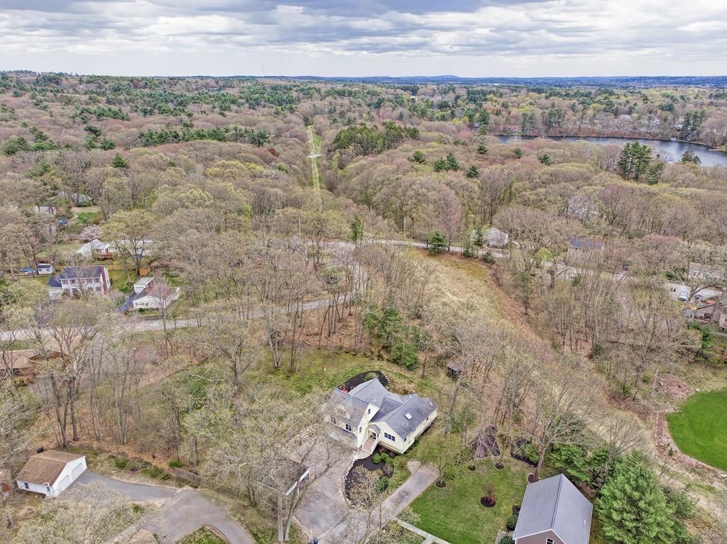 18 Massasoit Path Wayland, MA 01778 - Photo 6 of 39 an aerial view of a house with a yard