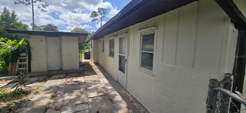 9060 Alan Boulevard Punta Gorda, FL 33982 - Photo 17 of 20 a view of a house with a porch