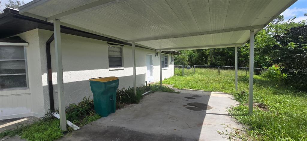 9060 Alan Boulevard Punta Gorda, FL 33982 - Photo 18 of 20 a view of a back yard of the house