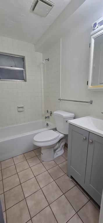 9060 Alan Boulevard Punta Gorda, FL 33982 - Photo 4 of 20 a bathroom with a sink a toilet and vanity