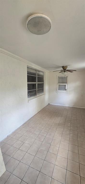 9060 Alan Boulevard Punta Gorda, FL 33982 - Photo 8 of 20 an empty room with windows