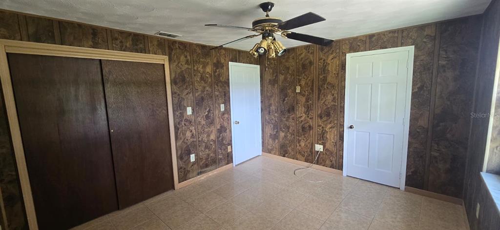 9060 Alan Boulevard Punta Gorda, FL 33982 - Photo 9 of 20 a view of a bathroom with a shower and a sink
