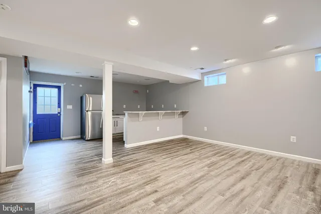 a kitchen with a refrigerator a sink and dishwasher
