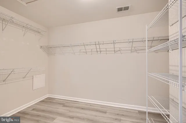 a view of a backyard with swimming pool