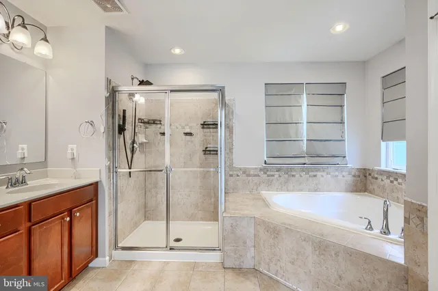 a sign board with a play ground in the back