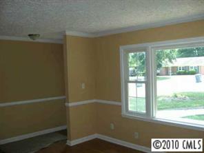 7416 Cormwell Lane Charlotte, NC 28217 - Photo 4 of 8 a view of an empty room with a window