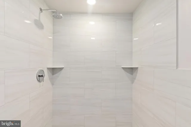 a view of an empty room with stairs