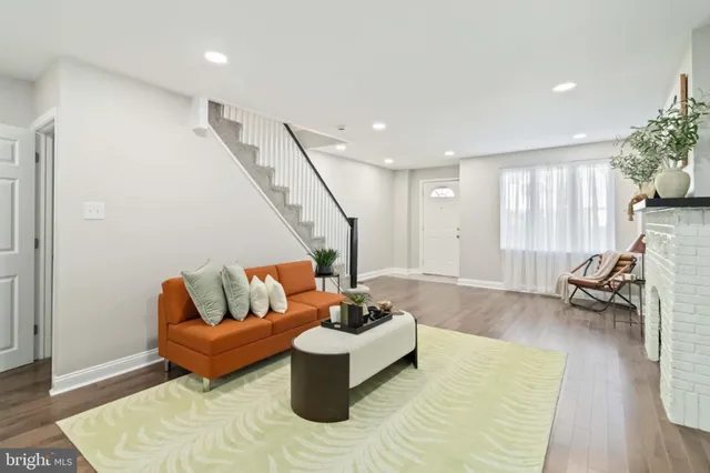 a living room with furniture and a couch