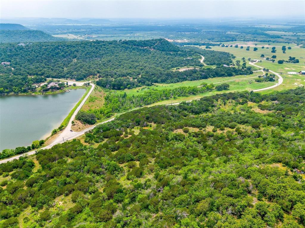A4 Art's Way Gordon, TX 76453 - Photo 8 of 17 a view of a city with lush green forest