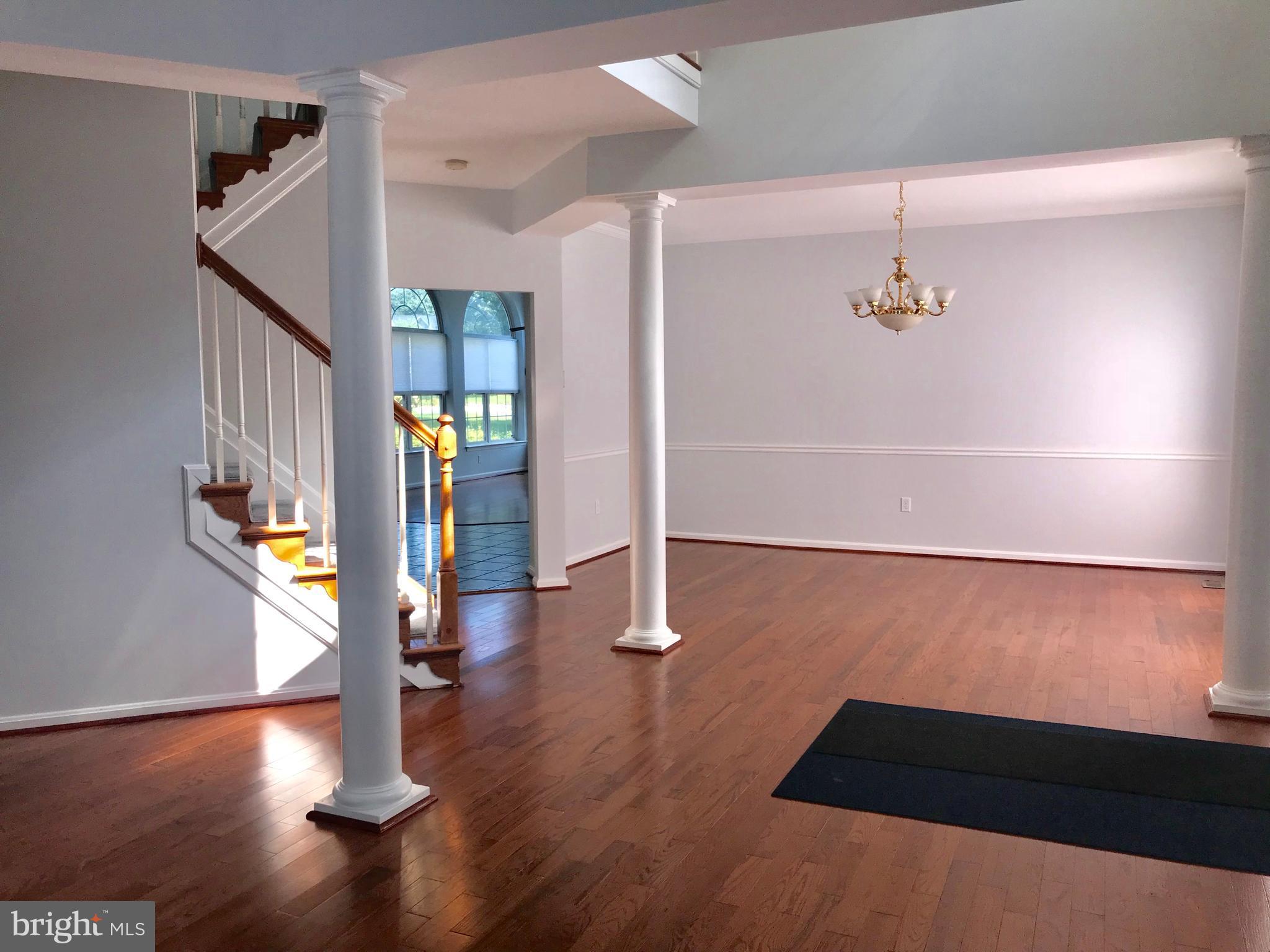 1532 Ringe Drive Severn, MD 21144 - Photo 8 of 27 a view of entryway with wooden floor