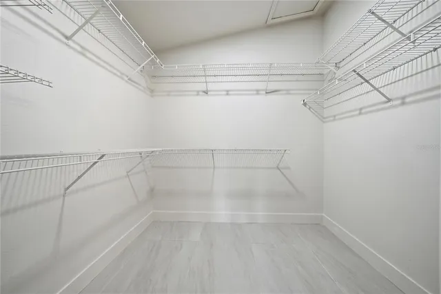 a view of a room with racks on the wall