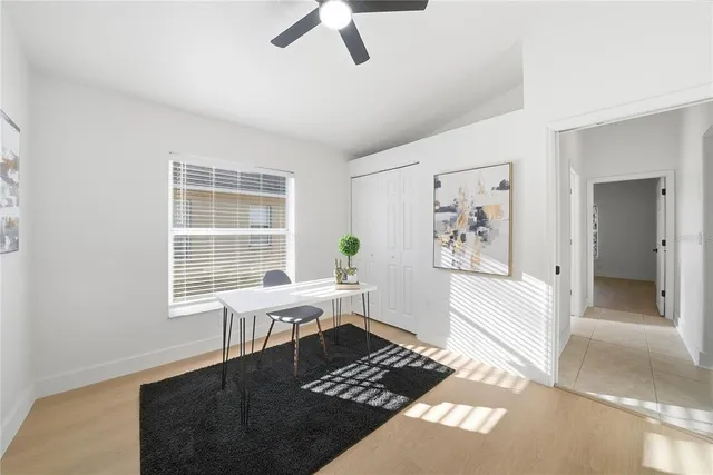 a living room with furniture and window