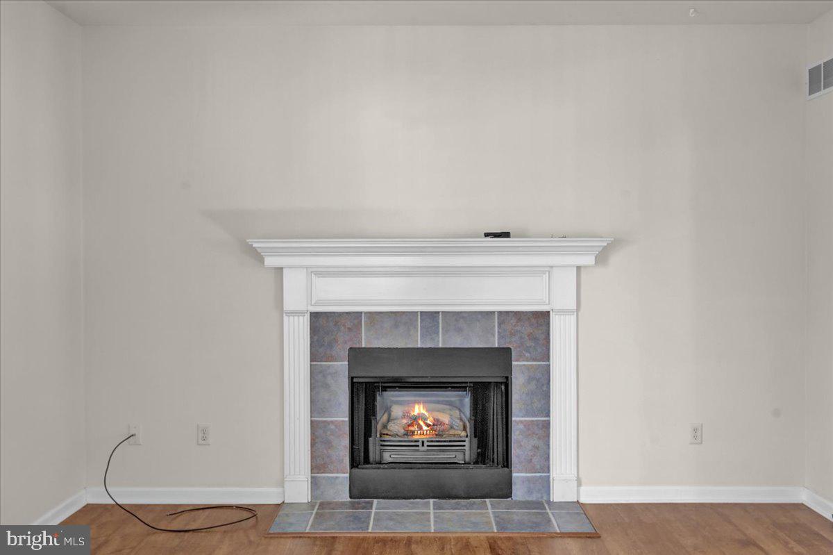 902 Bedford Avenue Reading, PA 19607 - Photo 18 of 48 a living room with a fireplace and a fireplace