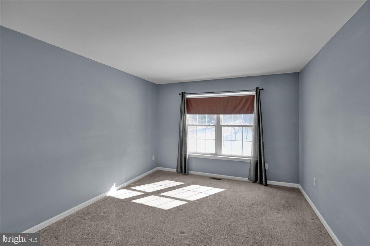 902 Bedford Avenue Reading, PA 19607 - Photo 32 of 48 an empty room with a window