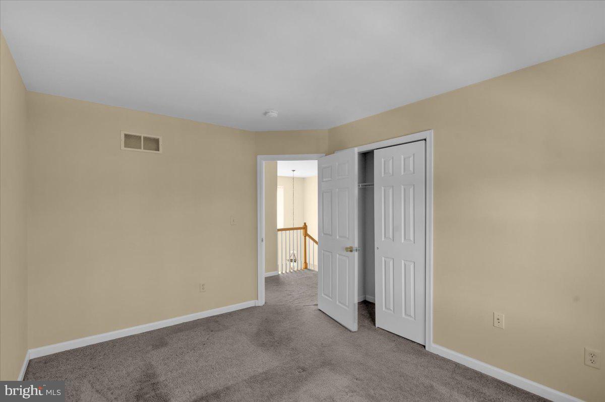 902 Bedford Avenue Reading, PA 19607 - Photo 35 of 48 a view of an empty room and window