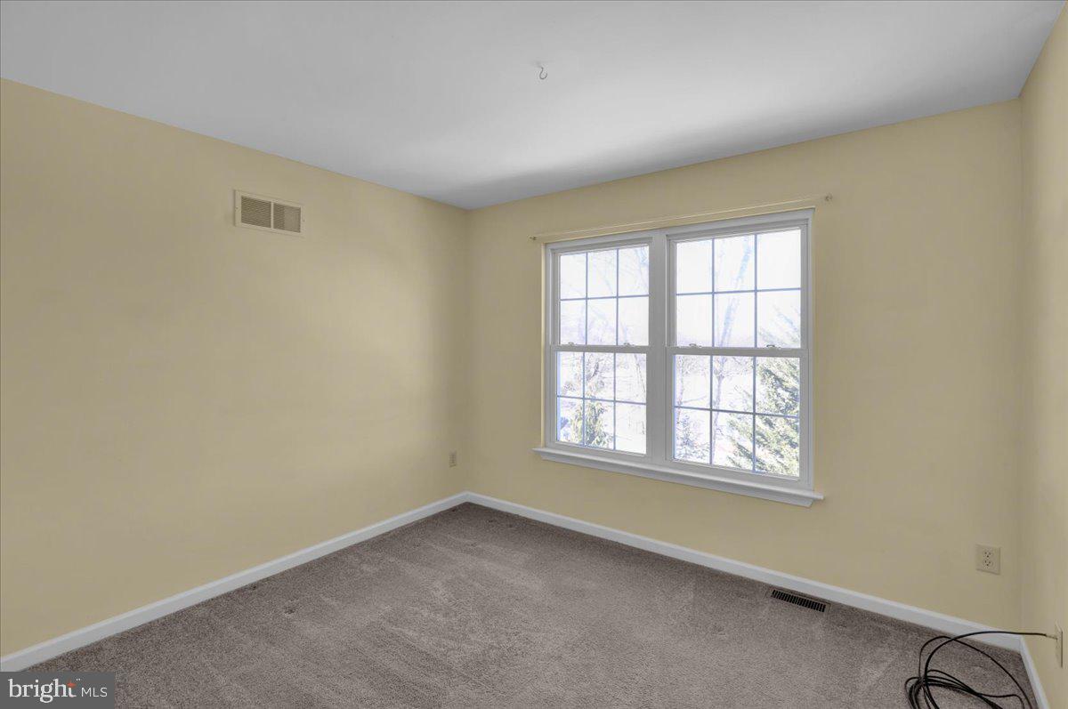902 Bedford Avenue Reading, PA 19607 - Photo 37 of 48 an empty room with a window
