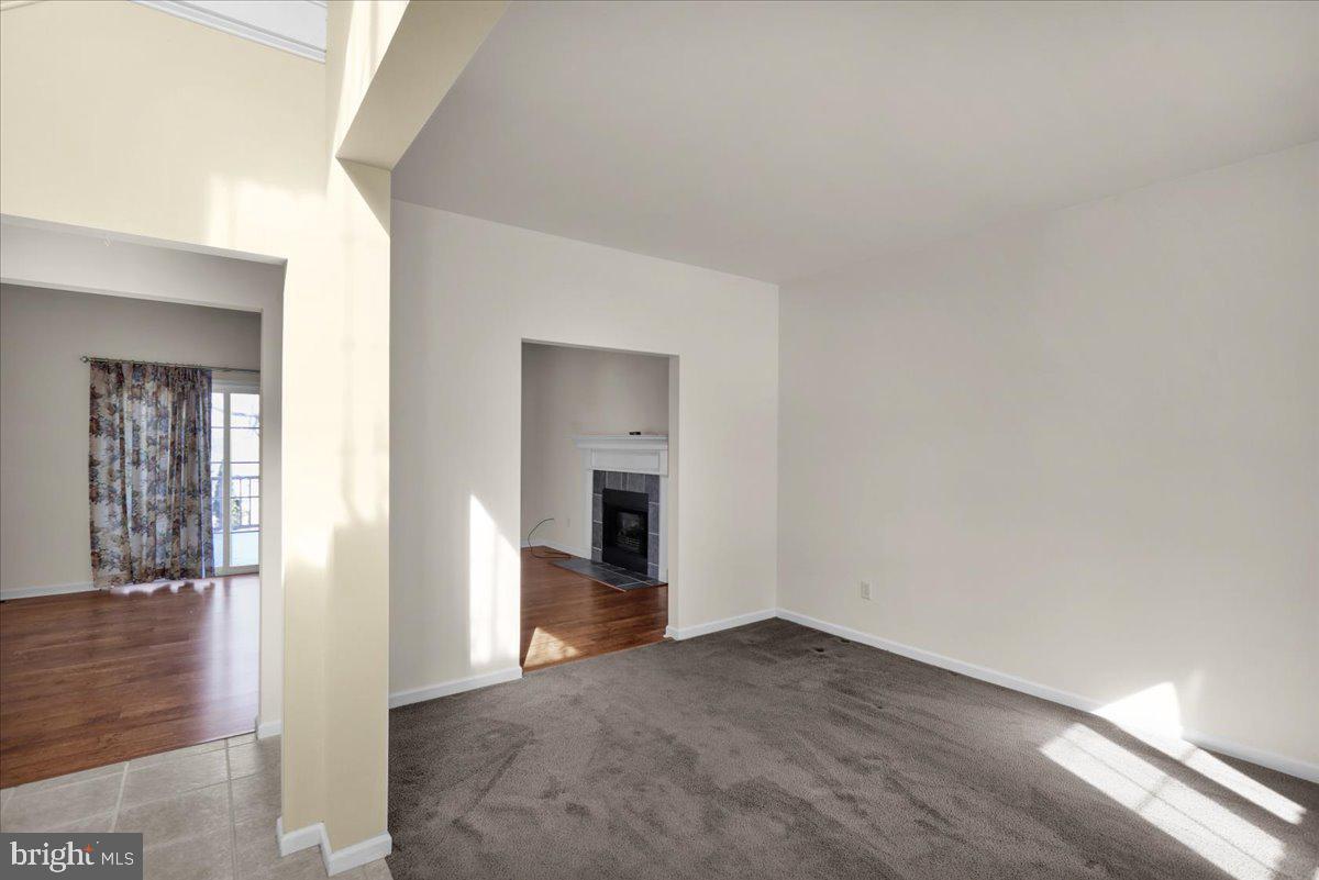 902 Bedford Avenue Reading, PA 19607 - Photo 6 of 48 a view of a hallway with wooden floor and closet