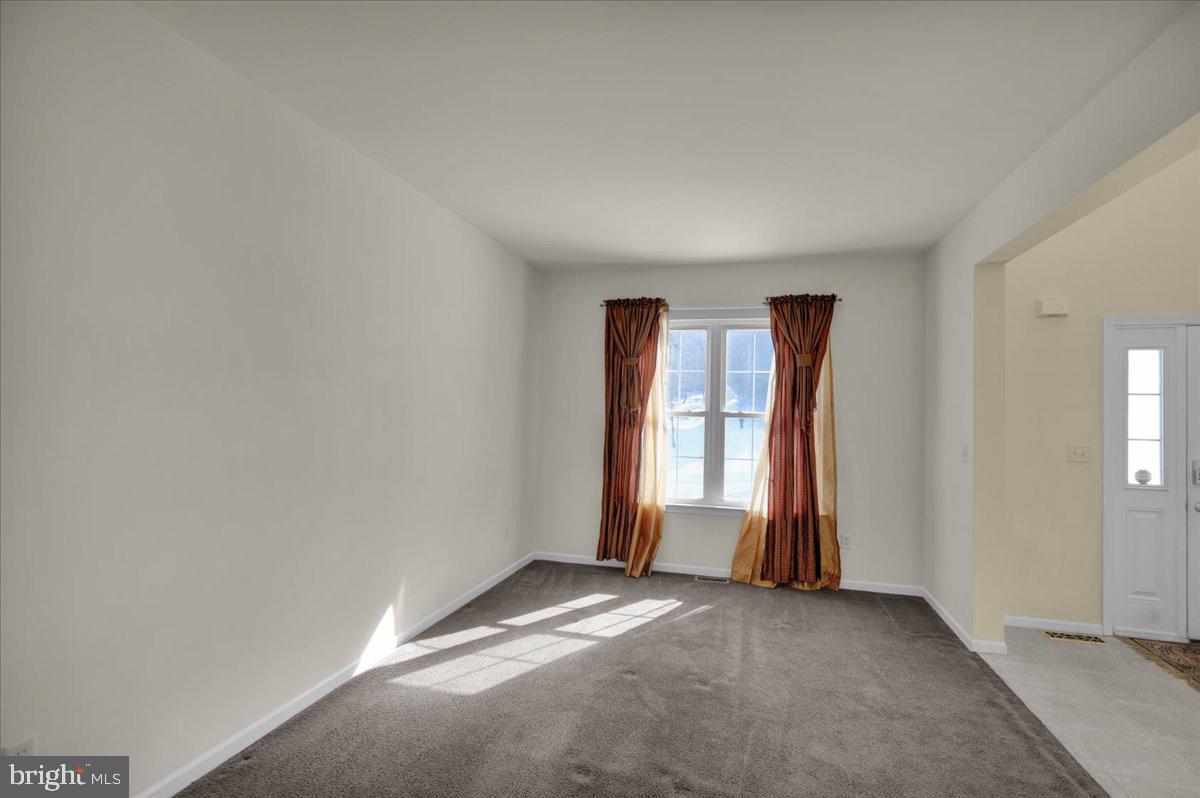 902 Bedford Avenue Reading, PA 19607 - Photo 7 of 48 an empty room with a window