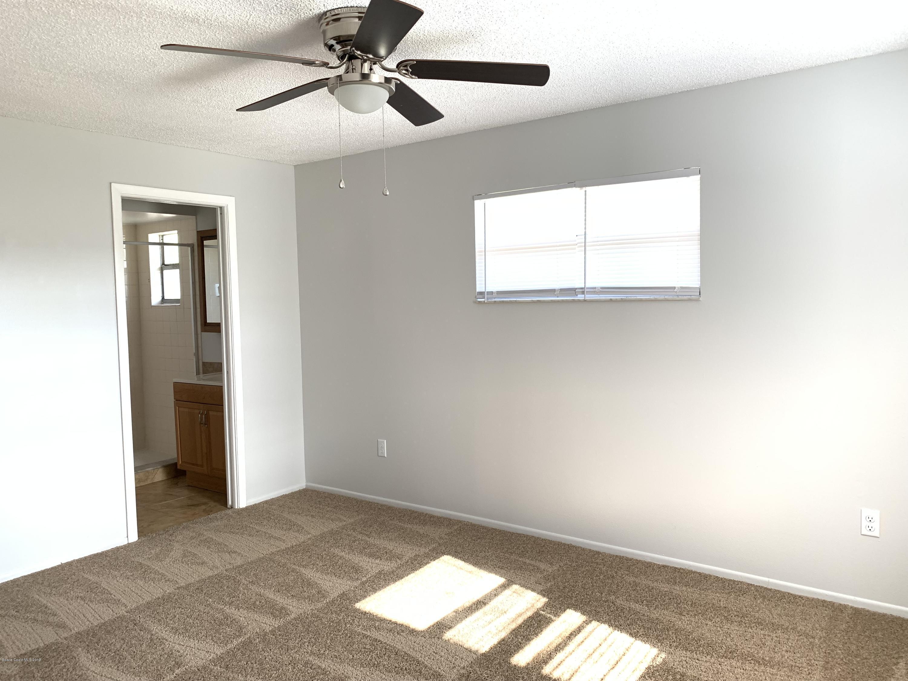 609 Croton Road Melbourne, FL 32935 - Photo 6 of 13 Master Bed