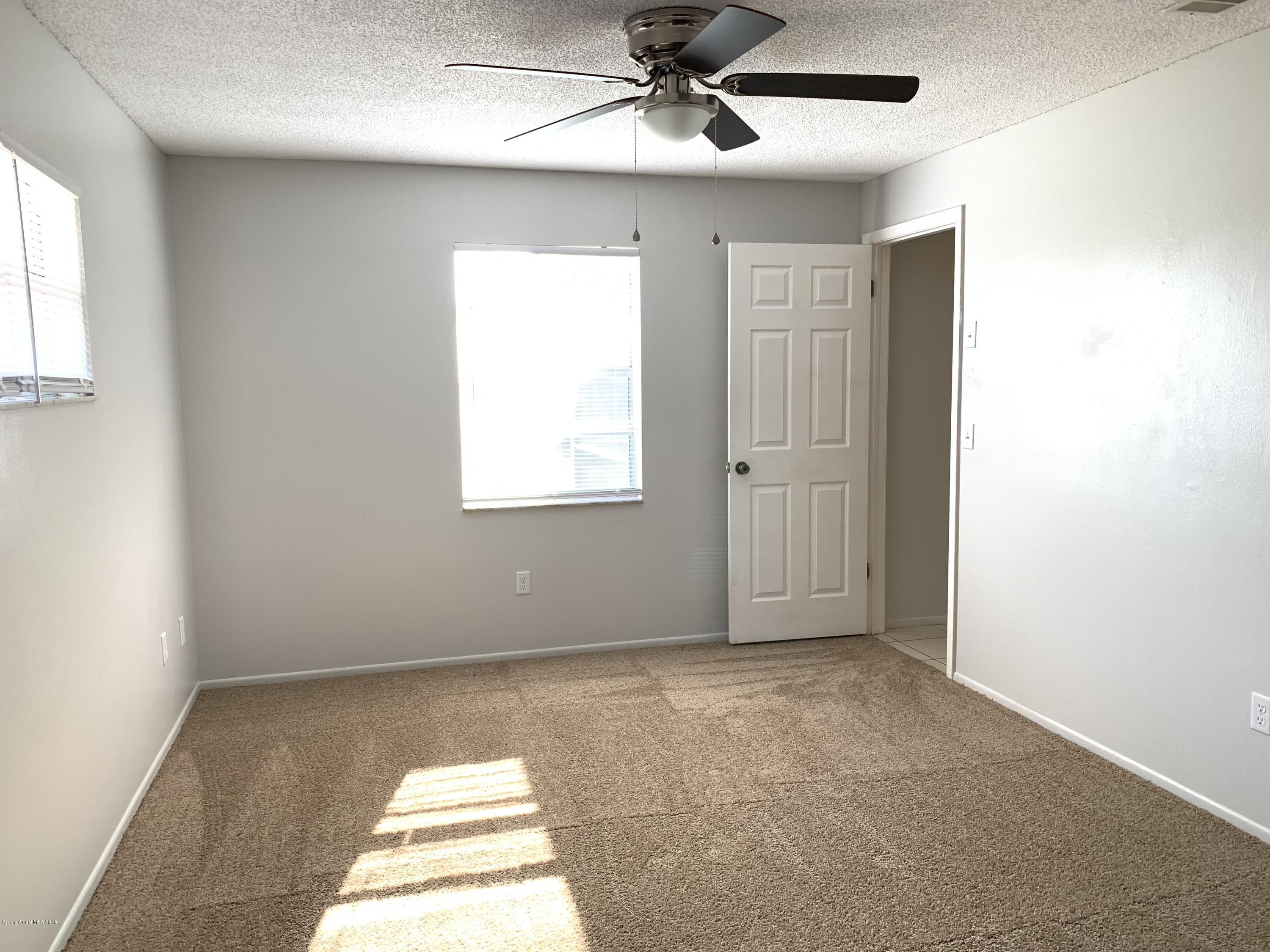 609 Croton Road Melbourne, FL 32935 - Photo 7 of 13 Master Bed